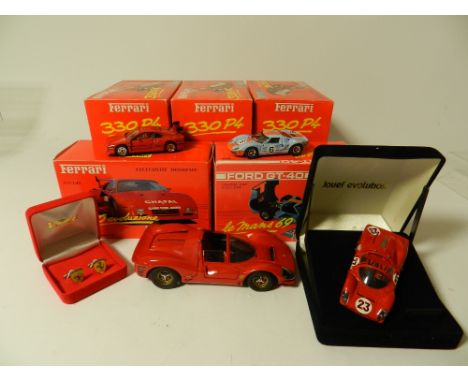 A group of ten boxed models to include six Ferrari 330 P4 cars in yellow, a GTO in red, a Ford GT40 in blue, a further P330 i