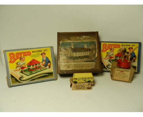 A mixed group of toys to include a good quantity of Bayko pieces including six bases and a large roof together with a mixture