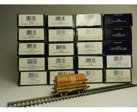 Twenty one boxed Bachmann rolling stock wagons, models include tank wagons, plank wagons, salt wagons, brake vans and others 