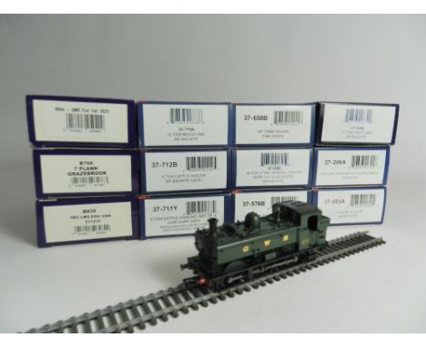 A Bachmann 32-208 Class 8750 Pannier Tank in GWR green together with nine Cat ref 37 - Bachmann plank cattle and tank wagons 