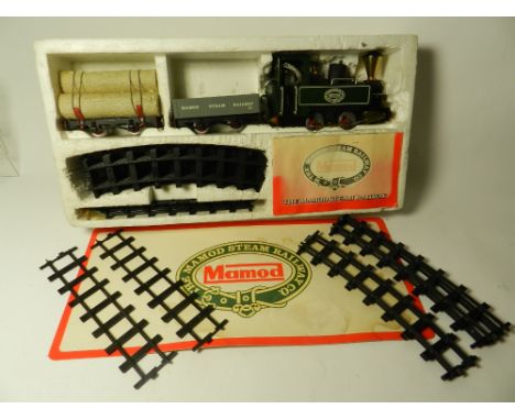 A boxed Mamod RSI live stream train set, comprising loco, two wagons all original accessories and with extra tracks giving si