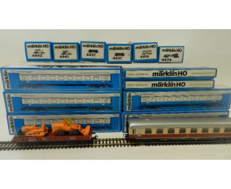 A collection of boxed Marklin HO items to include 5 X 4085 1st class passenger compartment car, 6 x assorted freight rolling 