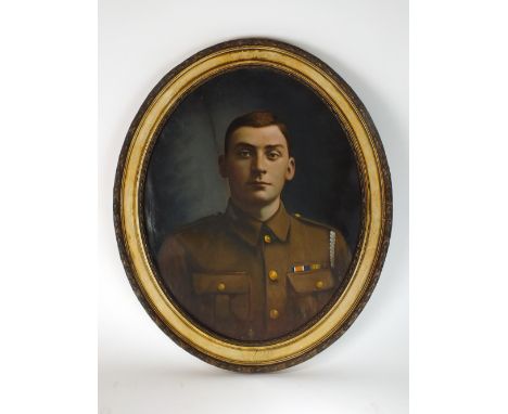 English school (early 20th century), an oil portrait of a First World War soldier, oval, overall size 50cm wide x 59cm high