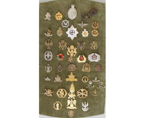 A collection of assorted British, Commonwealth and Foreign Army Cap Badges, originals and re-strikes (approx 44)