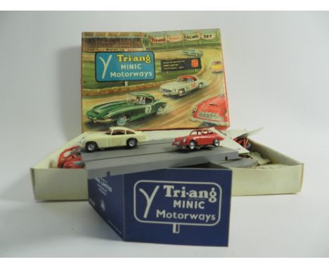 A Triang Minic Motorway Set No. M1525, in original box, the set contains eight curves and two straights, two cars, an Aston M