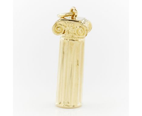 18k yellow gold pendant in the form of an Ionic column. With a jump ring bale. Marked 750 and 6.96. Jump ring marked indistin