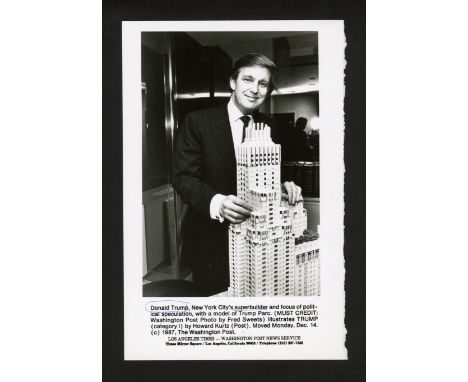 One gelatin silver print or original vintage photographic reproduction from the archives of the Star Tribune depicting a pres