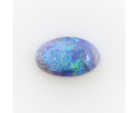One 1.05 ct black opal cabochon, blue and green play of colors.Length: 9.45 mm x width: 5.87 mm x depth: 3.01 mm. Gross weigh