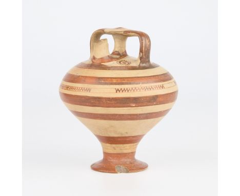 Ancient Mycenaean Greek pottery stirrup-spout jar, ca. 1425-1100 BCE. With twin strap handles flanking the false neck and a s