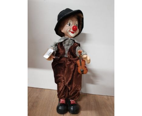 PORCELAIN HEADED MUSICAL CLOWN PLAYING VIOLIN IN WORKING ORDER