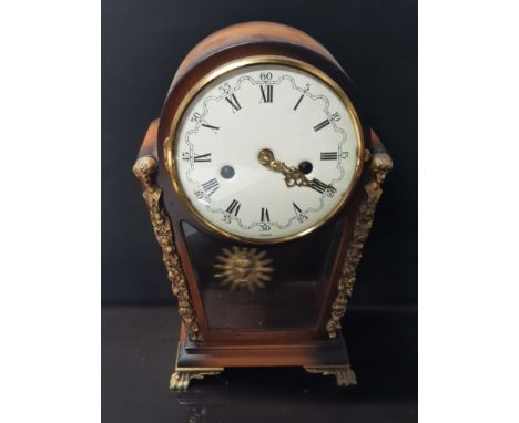 BEAUTIFUL REPRODUCTION MAHOGANY MANTLE CLOCK WITH BRASS EFFECT FEET AND SIDES ALSO INCLUDES SUN DIAL PENDULUM