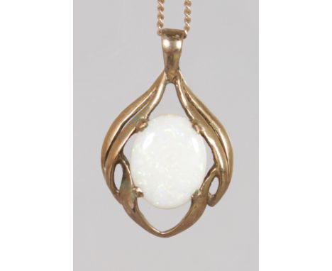 A GOLD OPAL PENDANT AND CHAIN.