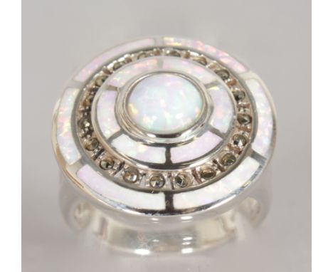 A SUPERB SILVER, OPAL AND MARCASITE CIRCULAR RING.