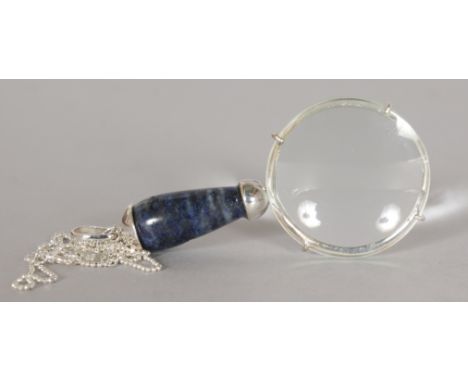 A SILVER AND LAPIS SPY GLASS PENDANT on a chain.