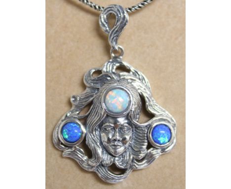 AN ART DECO SILVER OPAL AND LAPIS PENDANT AND CHAIN.