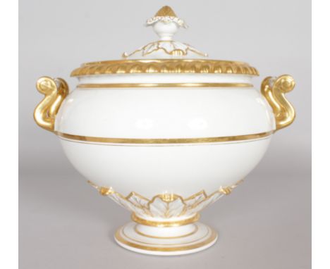 A LARGE WORCESTER TWO HANDLED CIRCULAR TUREEN AND COVER, white body with gilt decoration.