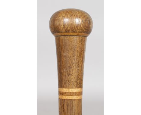 AN ELM AND BOXWOOD STICK. Date: 1890.  Country: English. An unusual and attractive stained elm stick with boxwood banding. 36