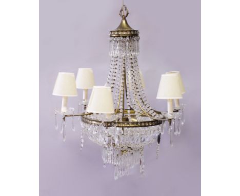 AN ORNATE BRASS AND CUT GLASS SIX BRANCH CHANDELIER. 3ft 0ins high.