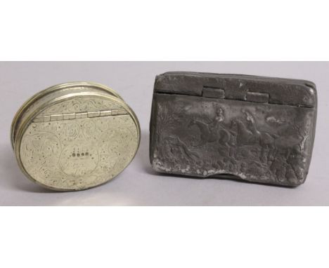 AN ENGRAVED BRASS SNUFF BOX, engraved C. MARSH 1869, and a PEWTER SNUFF BOX, the lid with a fox hunting scene (2).