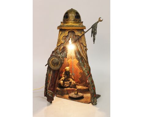 A SUPERB COLD CAST BRONZE TENT LIGHT by BERGMAN, an Arab sitting inside the tent. 13.5ins high. Signed GUSHULTZ &amp; B.