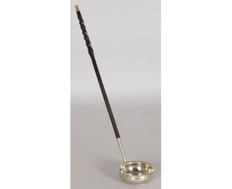 A SILVER TODDY LADLE with twist handle.
