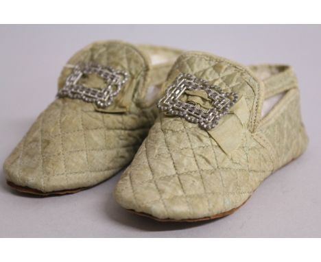 A RARE PAIR OF VICTORIAN BABIES SHOES with pierced buckles.