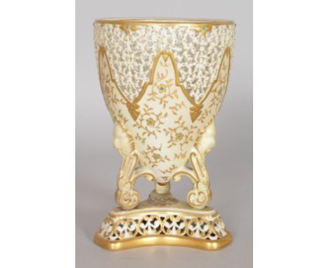 A GRAINGER & CO ROYAL WORCESTER PIERCED URN with gilt decoration (lid broken).