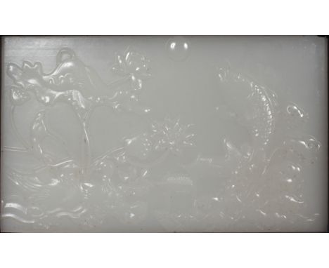 A CHINESE HARDWOOD & WHITE JADE-LIKE TABLE SCREEN, the inset panel decorated in relief with a carp jumping from waves and wit