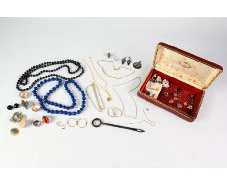 RED FABRIC TRINKET BOX containing a silver and marcasite RING, a Thai silver and black enamelled CIRCULAR BROOCH and pair of 