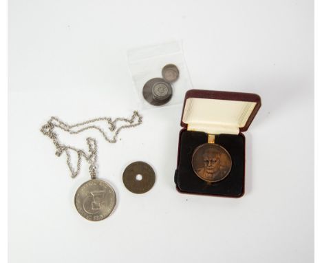 MARIA THERESA SILVER THALER encapsulated in plastic and card display together with a RIFLE CLUBS PIERCED BRONZE MEDALLION in 