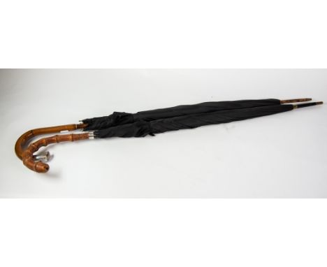 UMBRELLAS: two early 20th century silver mounted gentlemen’s black umbrellas, one Lonon 1922 by M Jacobs &amp; co, the other 