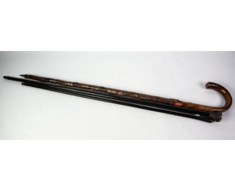 EBONY WALKING STICK, with engine turned silver pommel, hallmarked London 1926; a St. John's Ambulance Brigade ebonised SWAGGE