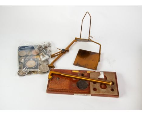PAIR OF VINTAGE AIRMAIL POSTAL SCALES on a wooden base with seven weights, together with a plastic wallet of BRITAIN'S FIRST 
