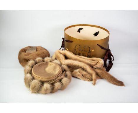 CARDBOARD VINTAGE OVAL HATBOX, labelled - Millinery by Kendal Milne, containing a cream pastel MINK NARROW STOLE, comprising 