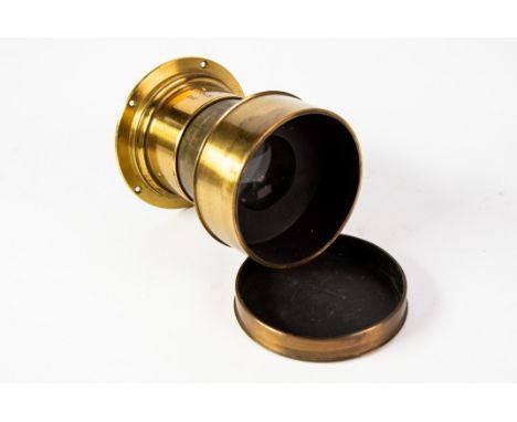 ANTIQUE BRASS LENS: A 19th century A. Ross of London brass portrait lens, serial no. 3083, no Waterhouse stops slot so fixed 