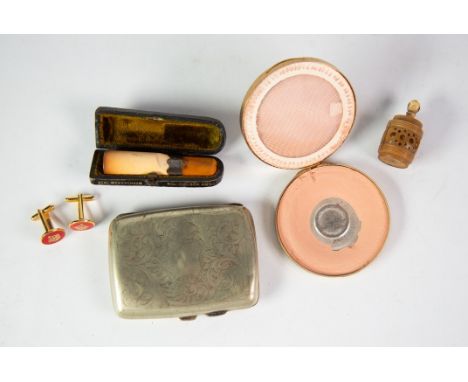 MEERSCHAUM AND AMBER CIGAR HOLDER, with silver collar, in morocco fitted case; a late 19th Century CARVED NUT CASE FOR A TAPE