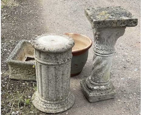 A reconstituted stone garden trough planter, with bird table, glazed pot and stand.
