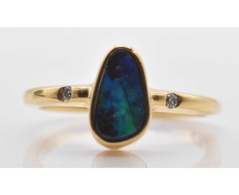 An 18ct yellow gold boulder opal and twin stone diamond set ring, size M 1/2, approx 3.8g.Provenance: Presented with receipt 