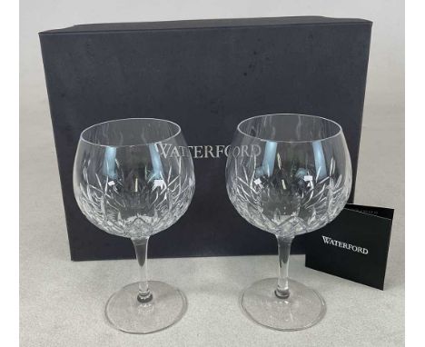 WATERFORD CRYSTAL; two crystal Gin Journeys balloon glasses, 'Lismore', both 550ml, with box and care leaflet