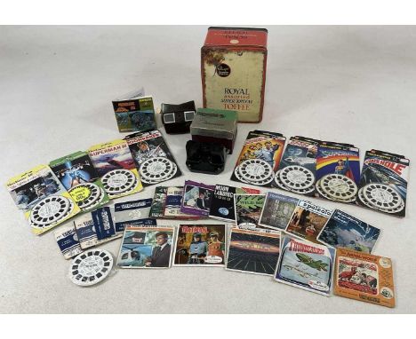 VIEW MASTER; two stereoscope viewers with paperwork and various slides, twenty titles with approx three discs in each, to inc