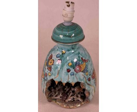 KERIMA GUALDO T; an Italian majolica style fish lampbase hollowed out to reveal an underwater scene, height 30cm.Condition Re