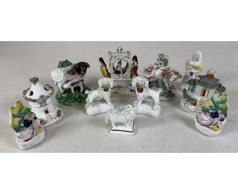 A group of predominantly 19th century small Staffordshire, also a late 18th century Derby figure of a cow and a small Sitzend