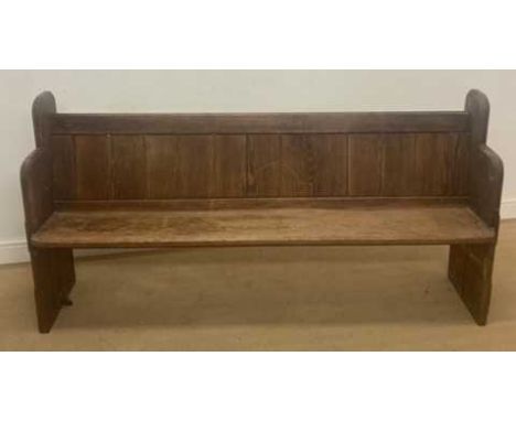A pine church pew, height 88cm, width 183cm