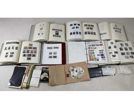 Five Windsor Great Britain stamp albums, vols I to V, inclusive, together with an Isle of Man stamp album, a ring binder of w