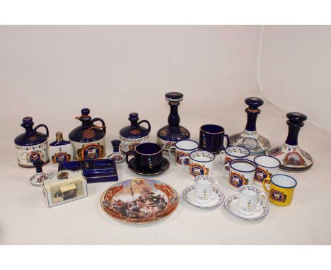 PUSSER'S RUM; a group of decorative ceramics and enamelled wares including two ship's decanters, further decanters, cups and 