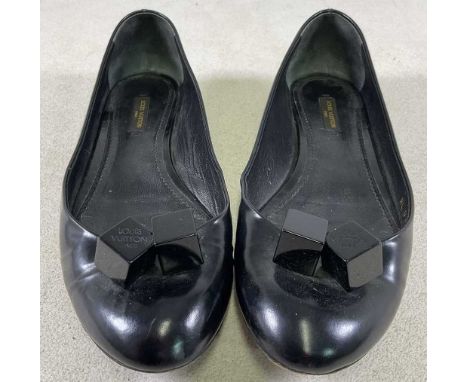 LOUIS VUITTON; a pair of black dice ballerina flats, size 39.5, unboxed.