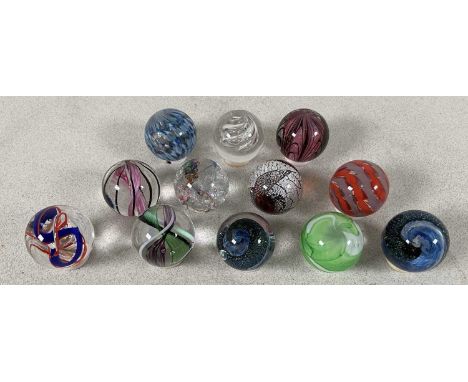 TEIGN VALLEY GLASS; a set of twelve marbles, in original boxes, eleven presented with the circular presentation stands.