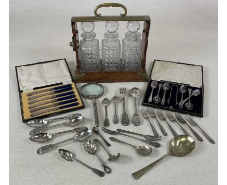 A quantity of silver plated flatware items, including some cased, together with a Betjemann's Patent tantalus.