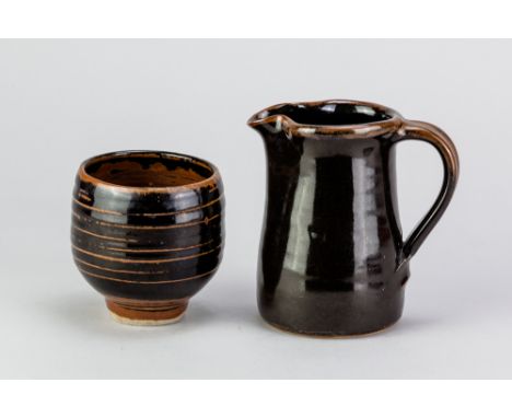 DAVID LEACH (1911-2005) for Lowerdown Pottery; a stoneware jug covered in tenmoku breaking to kaki glaze, impressed DL mark, 