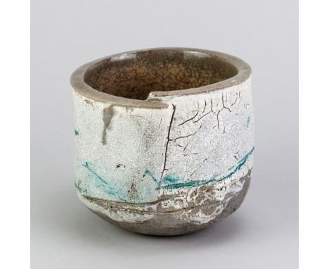 HAGUIKO (FUKUYAMA) (born 1948); a raku bowl with stepped rim, copper green and wax resist decoration, impressed mark, diamete